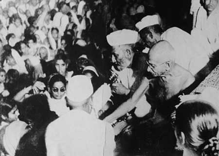 Gandhiji and Khan Abdul Gaffar Khan meeting with the villagers of Bihar during the communal frenzy.jpg
